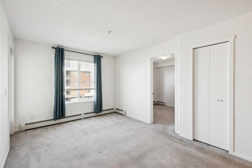 2407-4641 128 Avenue Ne, Calgary, AB - Indoor Photo Showing Other Room