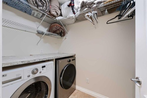 8245 Saddlebrook Drive Ne, Calgary, AB - Indoor Photo Showing Laundry Room