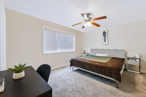 8245 Saddlebrook Drive Ne, Calgary, AB - Indoor Photo Showing Bedroom