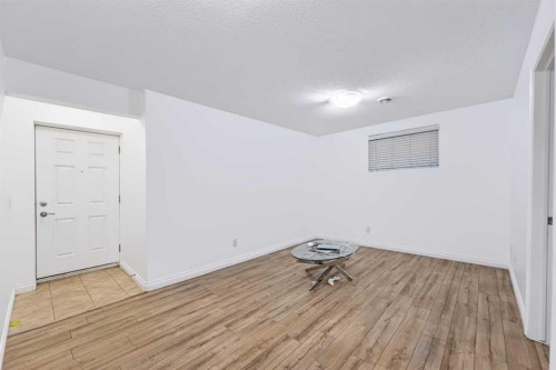 8245 Saddlebrook Drive Ne, Calgary, AB - Indoor Photo Showing Other Room