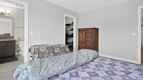 149 Saddlestone Drive Ne, Calgary, AB - Indoor Photo Showing Bedroom