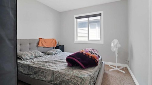 149 Saddlestone Drive Ne, Calgary, AB - Indoor Photo Showing Bedroom