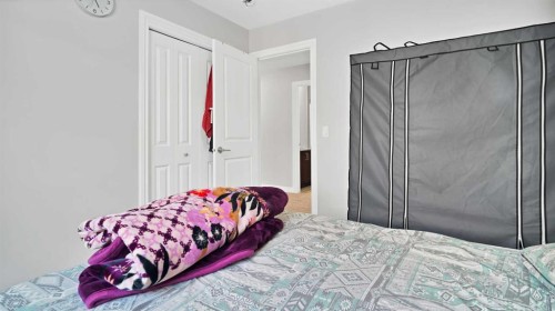 149 Saddlestone Drive Ne, Calgary, AB - Indoor Photo Showing Bedroom