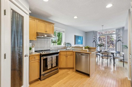 258 West Ranch Place Sw, Calgary, AB - Indoor Photo Showing Kitchen With Stainless Steel Kitchen