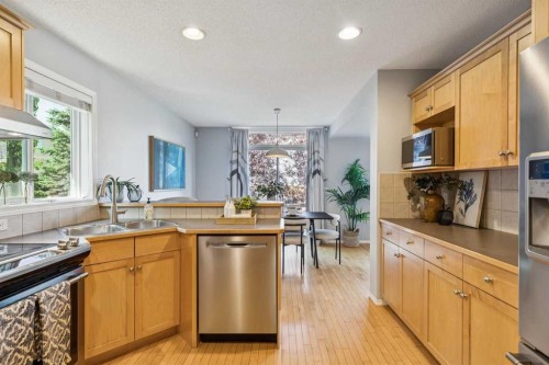 258 West Ranch Place Sw, Calgary, AB - Indoor Photo Showing Kitchen With Double Sink