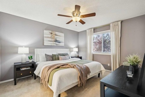 258 West Ranch Place Sw, Calgary, AB - Indoor Photo Showing Bedroom