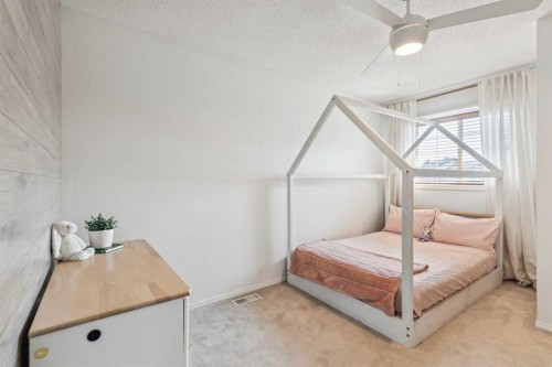 258 West Ranch Place Sw, Calgary, AB - Indoor Photo Showing Bedroom