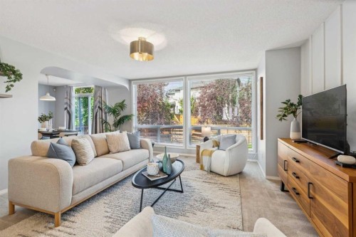258 West Ranch Place Sw, Calgary, AB - Indoor Photo Showing Living Room