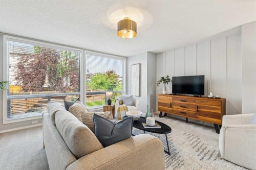 258 West Ranch Place Sw, Calgary, AB - Indoor Photo Showing Living Room