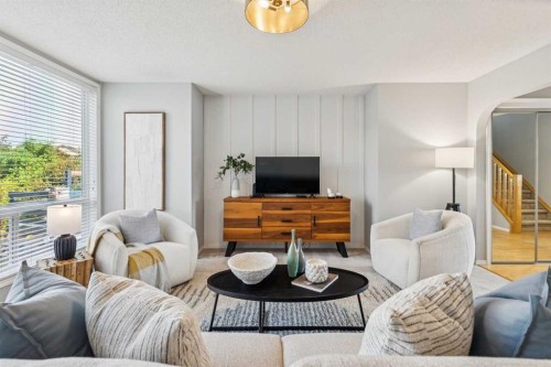 258 West Ranch Place Sw, Calgary, AB - Indoor Photo Showing Living Room