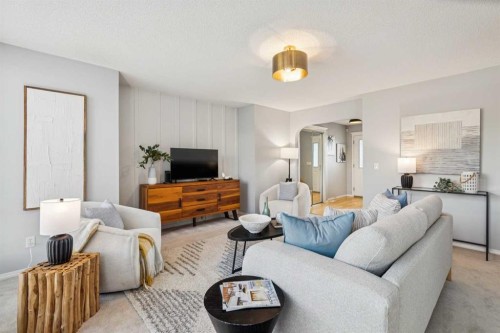 258 West Ranch Place Sw, Calgary, AB - Indoor Photo Showing Living Room