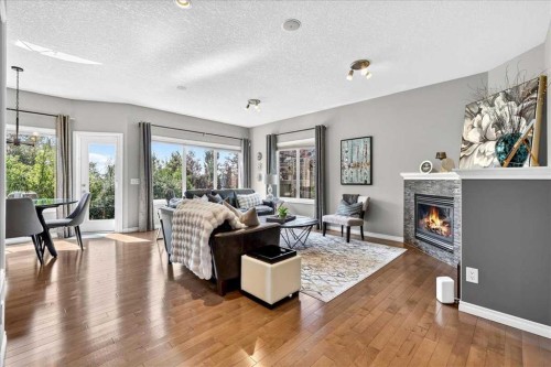 122 Royal Birkdale Crescent Nw, Calgary, AB - Indoor Photo Showing Living Room With Fireplace