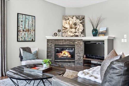 122 Royal Birkdale Crescent Nw, Calgary, AB - Indoor Photo Showing Living Room With Fireplace