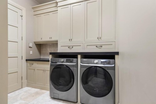 136 Posthill Drive Sw, Calgary, AB - Indoor Photo Showing Laundry Room