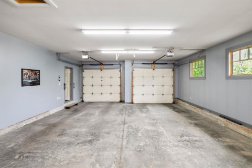 136 Posthill Drive Sw, Calgary, AB - Indoor Photo Showing Garage