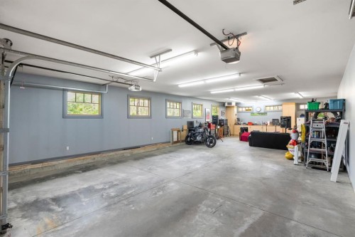 136 Posthill Drive Sw, Calgary, AB - Indoor Photo Showing Garage