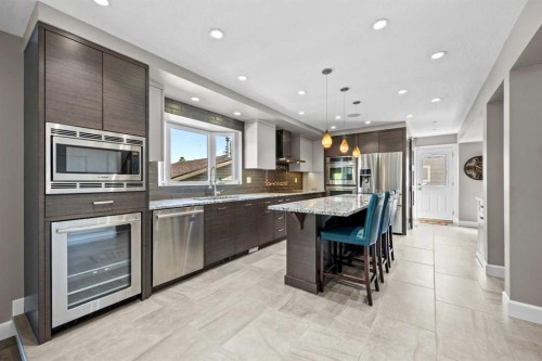 8 Millside Court Sw, Calgary, AB - Indoor Photo Showing Kitchen With Upgraded Kitchen
