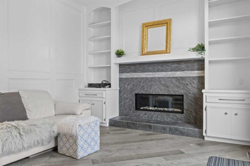 8 Millside Court Sw, Calgary, AB - Indoor With Fireplace