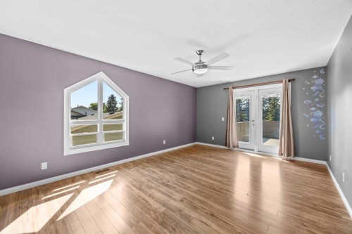 8 Millside Court Sw, Calgary, AB - Indoor Photo Showing Other Room