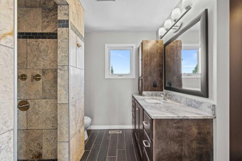 8 Millside Court Sw, Calgary, AB - Indoor Photo Showing Bathroom