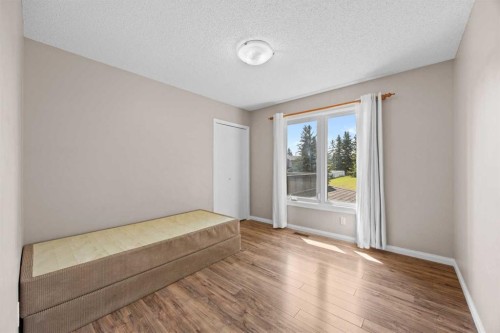 8 Millside Court Sw, Calgary, AB - Indoor Photo Showing Other Room