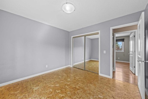 8 Millside Court Sw, Calgary, AB - Indoor Photo Showing Other Room
