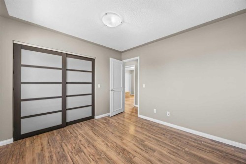 8 Millside Court Sw, Calgary, AB - Indoor Photo Showing Other Room