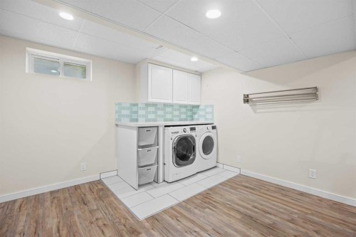 8 Millside Court Sw, Calgary, AB - Indoor Photo Showing Laundry Room
