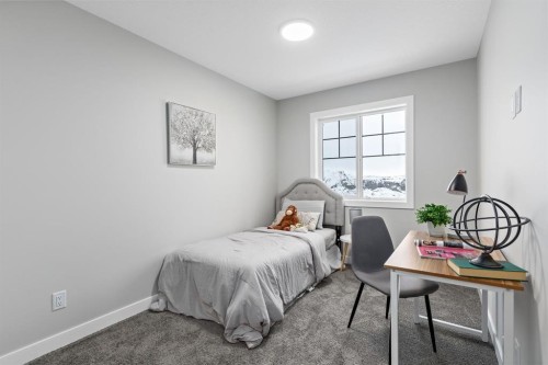 943 Legacy Circle Se, Calgary, AB - Indoor Photo Showing Bedroom
