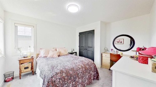 107 Auburn Sound Cove Se, Calgary, AB - Indoor Photo Showing Bedroom