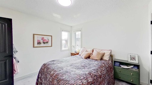 107 Auburn Sound Cove Se, Calgary, AB - Indoor Photo Showing Bedroom
