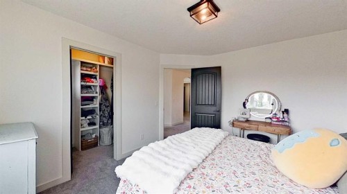 107 Auburn Sound Cove Se, Calgary, AB - Indoor Photo Showing Bedroom