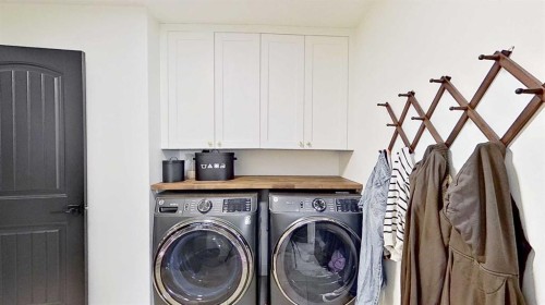 107 Auburn Sound Cove Se, Calgary, AB - Indoor Photo Showing Laundry Room