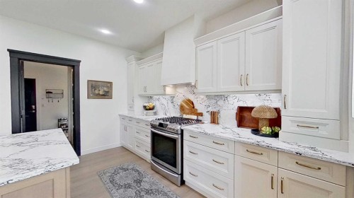 107 Auburn Sound Cove Se, Calgary, AB - Indoor Photo Showing Kitchen With Upgraded Kitchen
