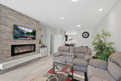 194 Cornerstone Road Ne, Calgary, AB - Indoor Photo Showing Living Room With Fireplace