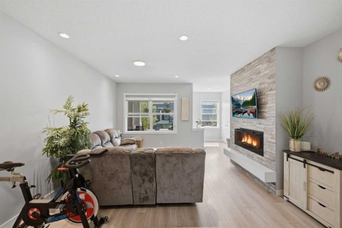 194 Cornerstone Road Ne, Calgary, AB - Indoor Photo Showing Living Room With Fireplace