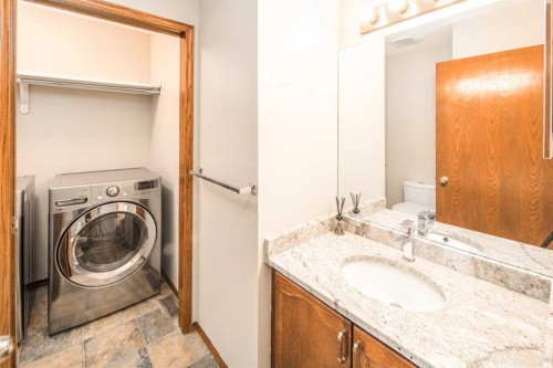 131 Edgebrook Close Nw, Calgary, AB - Indoor Photo Showing Laundry Room