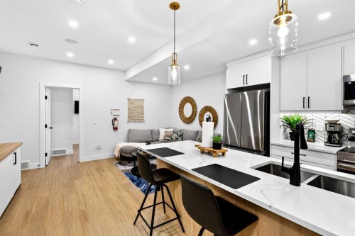 236 30 Avenue Ne, Calgary, AB - Indoor Photo Showing Kitchen With Double Sink