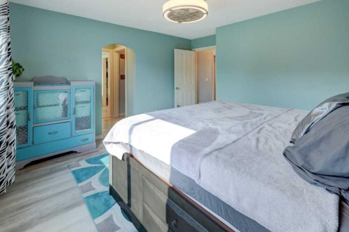242 Crystal Green Point, Okotoks, AB - Indoor Photo Showing Bedroom