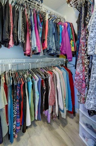 242 Crystal Green Point, Okotoks, AB - Indoor With Storage