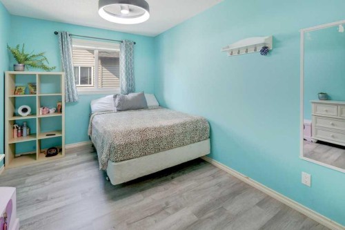 242 Crystal Green Point, Okotoks, AB - Indoor Photo Showing Bedroom