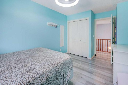 242 Crystal Green Point, Okotoks, AB - Indoor Photo Showing Bedroom