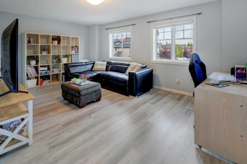 242 Crystal Green Point, Okotoks, AB - Indoor Photo Showing Living Room