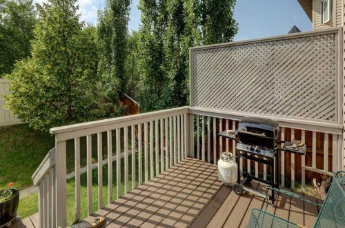 242 Crystal Green Point, Okotoks, AB - Outdoor With Deck Patio Veranda With Exterior