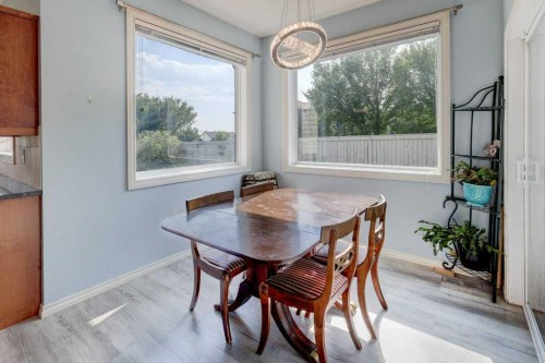 242 Crystal Green Point, Okotoks, AB - Indoor Photo Showing Dining Room