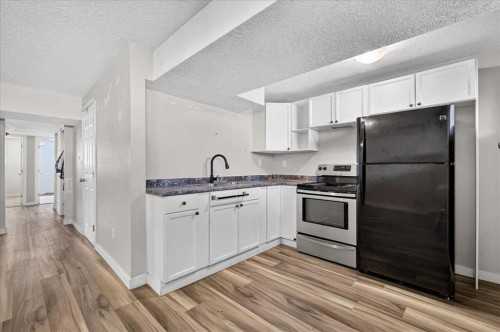 4309 26 Avenue Se, Calgary, AB - Indoor Photo Showing Kitchen With Upgraded Kitchen