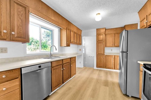 7819 7 Street Sw, Calgary, AB - Indoor Photo Showing Kitchen With Stainless Steel Kitchen With Double Sink