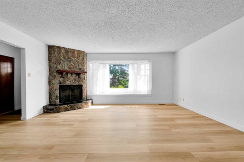 7819 7 Street Sw, Calgary, AB - Indoor With Fireplace
