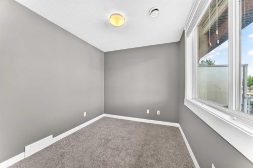 2-111 Rainbow Falls Gate, Chestermere, AB 
