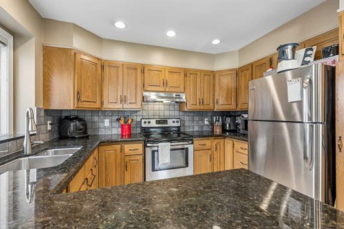 684 Sunmills Drive Se, Calgary, AB - Indoor Photo Showing Kitchen With Double Sink